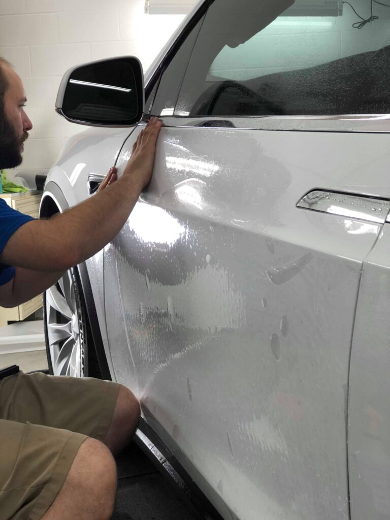 Midwest Tinting - Your Source for Tesla Model Upgrades - Window Tinting, Paint Protection Film and Vehicle Graphic work in the Kansas City Area. 2